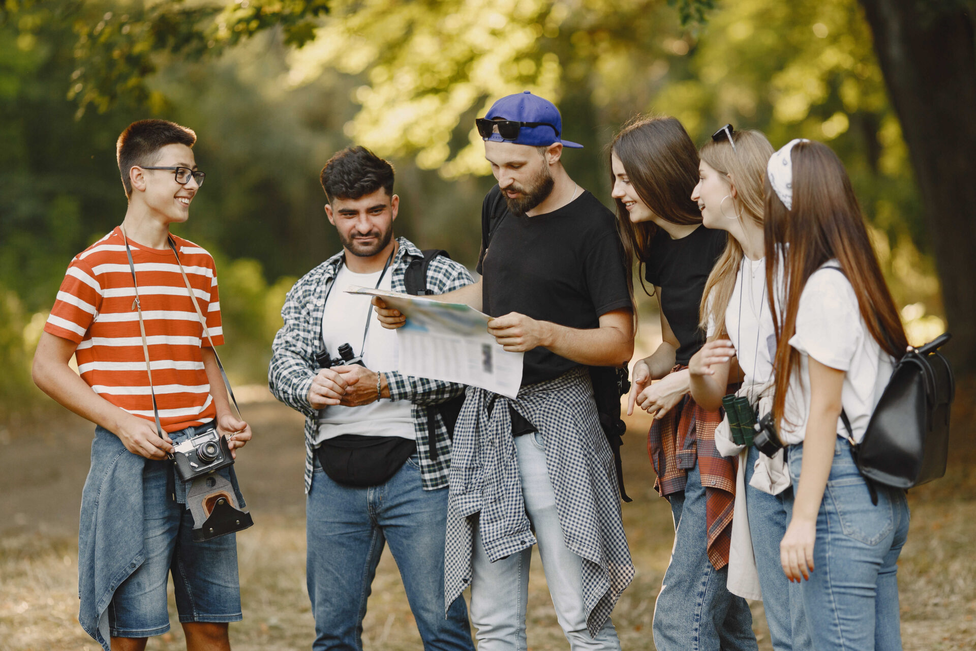 A tour guide leads a group of tourists 